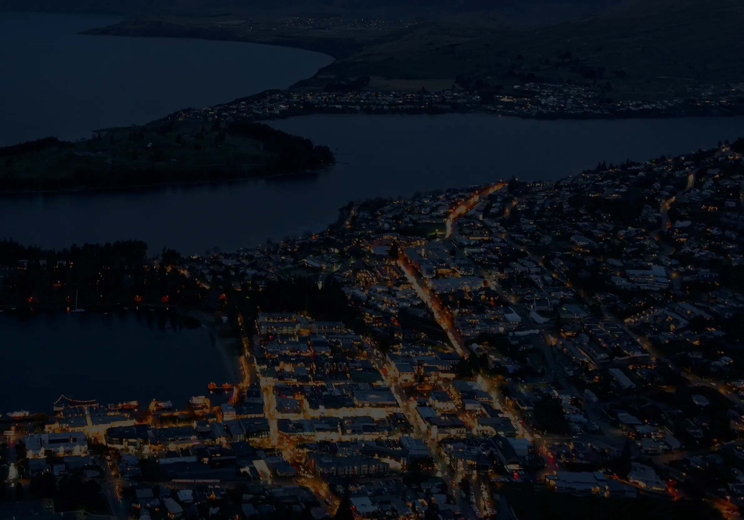 Darkened mountain slopes above Lake Wakatipu at dusk